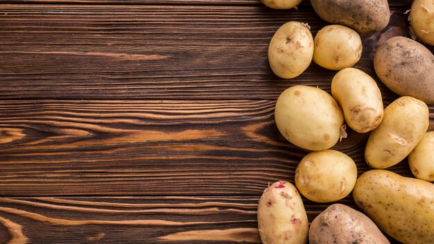Potatoes on table with copy-space