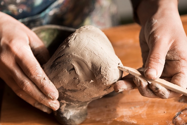 Free photo pottery creation workspace close-up