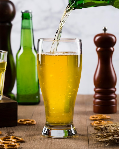 Free photo pouring beer in glass