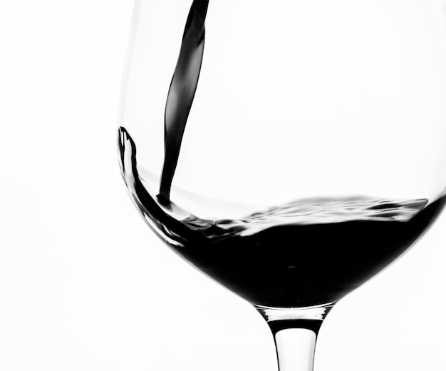 Free photo pouring a glass of red wine