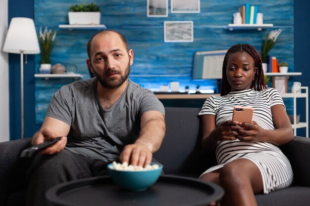 Pov of interracial couple expecting baby at home