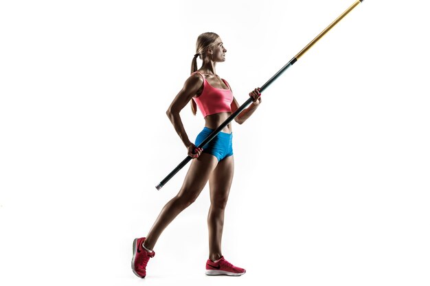 Power and beauty and purity. Professional female pole vaulter training on white wall. Fit and slim female model practicing. Concept of sport,