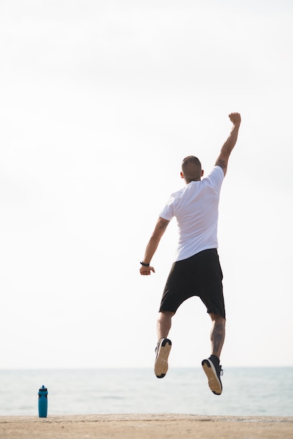 Powerful man celebrating his winning