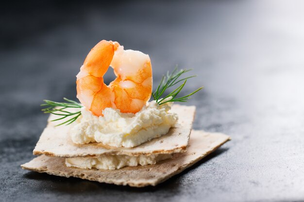 Prawn top with cheese underneath