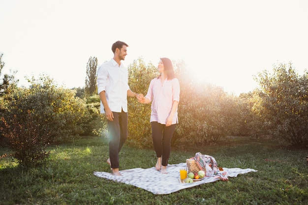 Pregnant couple on picnic