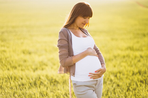 Pregnant woman in park