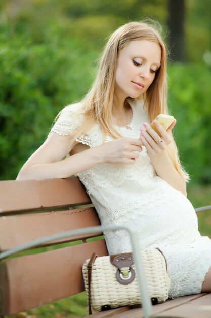 pregnant woman using mobile phone