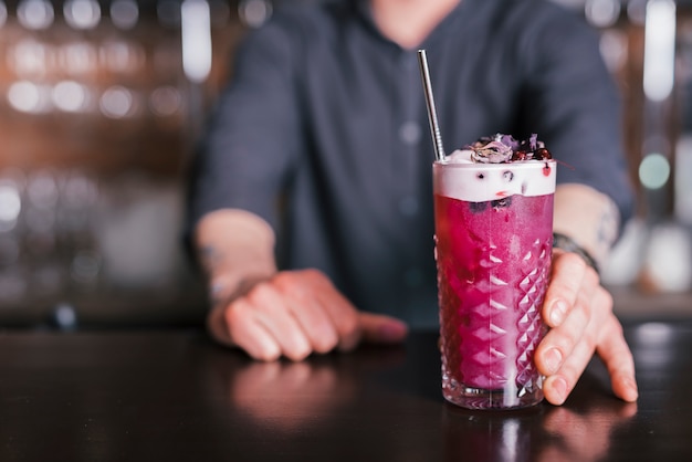 Preparing a refreshing cocktail in a bar