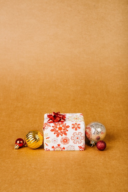 Present box and christmas balls