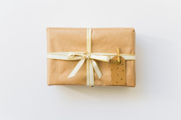 Present box in wrap with label