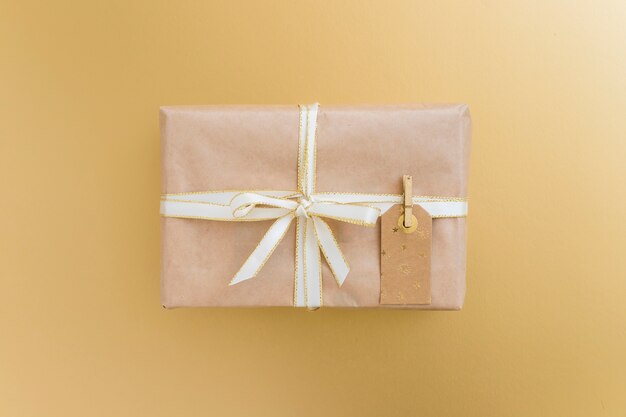 Present box in wrap with tag