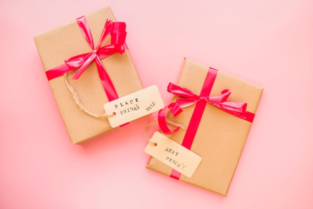 Free photo present boxes with red bows and sale tags