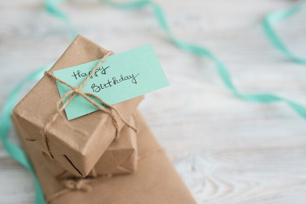 Present boxes wrapped in paper on table