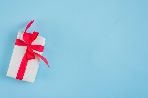 Present with red ribbon
