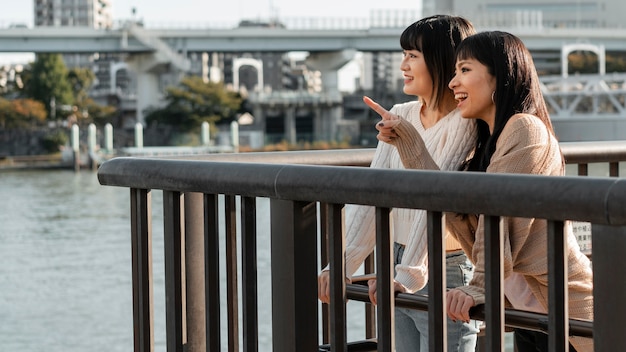 Pretty asian girls relaxing together