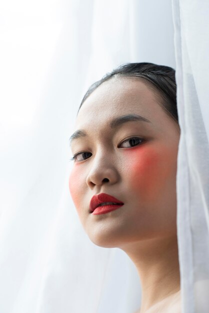 Pretty asian woman wearing make-up