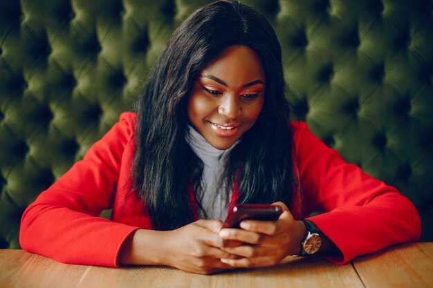 pretty black girl in a cafe