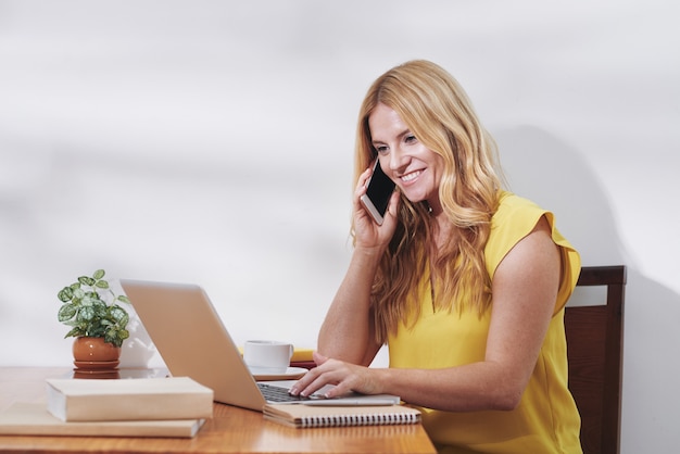 Pretty entrepreneur at office desk