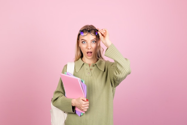 Free photo pretty european woman in casual sweater on pink wall