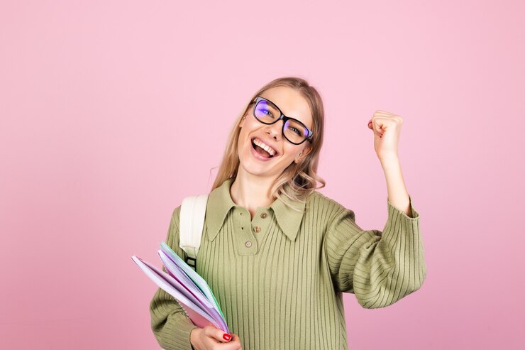 Free Photo pretty european woman in casual sweater on pink wall