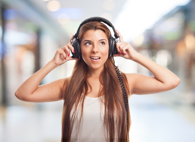 Pretty female in headphones