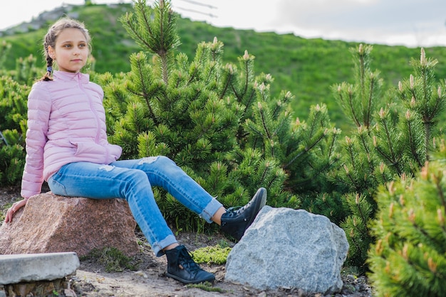 Pretty girl posing outdoors