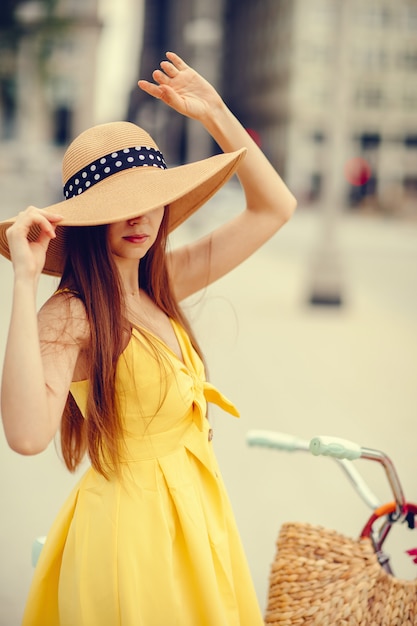 pretty girl with bicycle