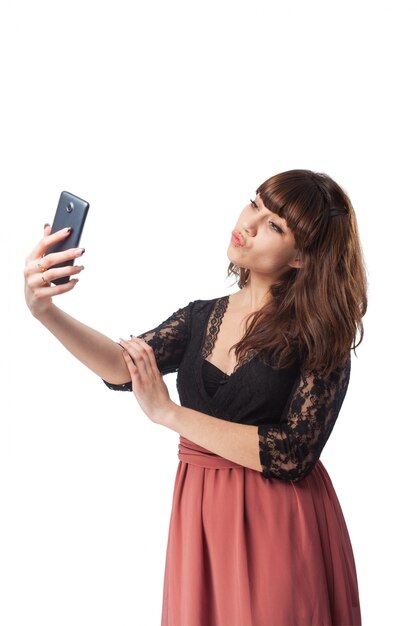 Pretty girl with fringe taking a photo