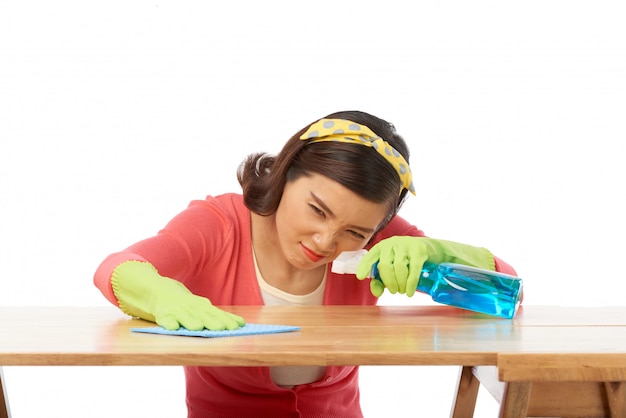 Pretty Housewife Polishing Table Surface