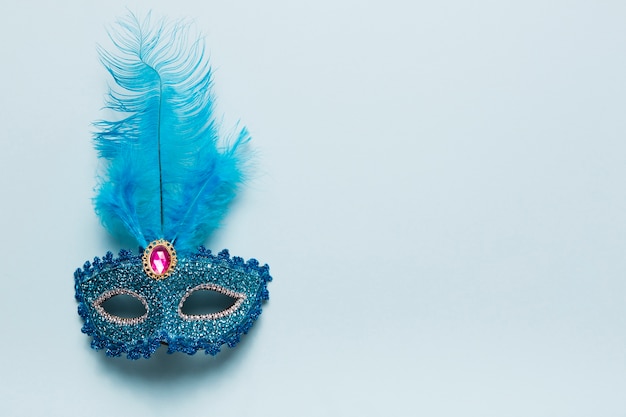 Pretty mask on blue