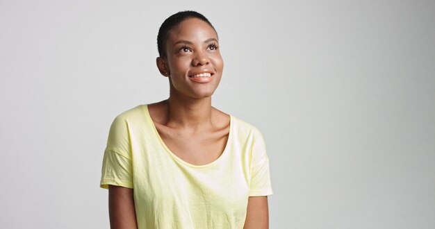 Pretty mixed race woman with short hair in studio shoot