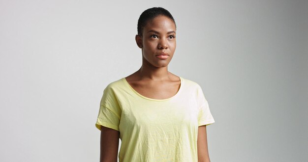 Pretty mixed race woman with short hair in studio shoot