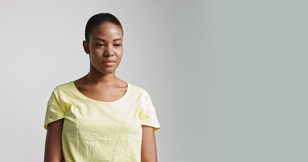 Pretty mixed race woman with short hair in studio shoot