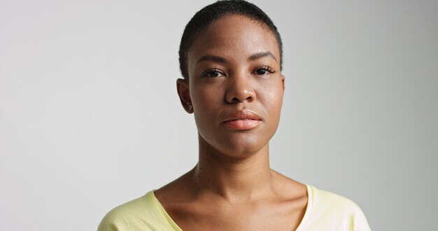 Pretty mixed race woman with short hair in studio shoot