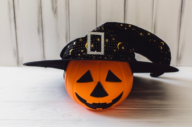 Free photo pretty pumpkin in witch hat