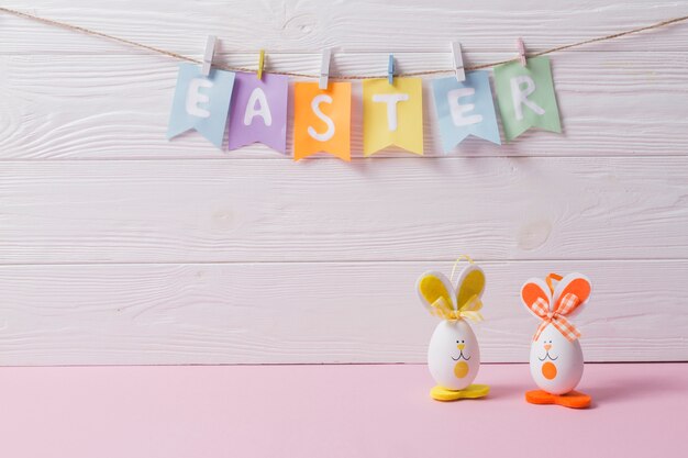 Pretty rabbit eggs near Easter writing