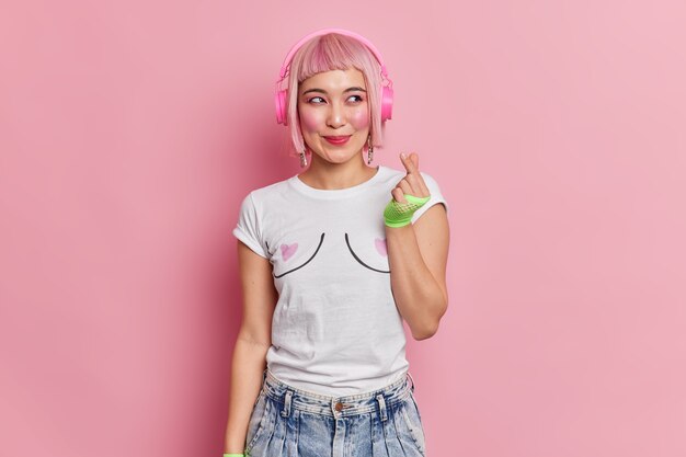 Pretty smiling girl with bob pink hair