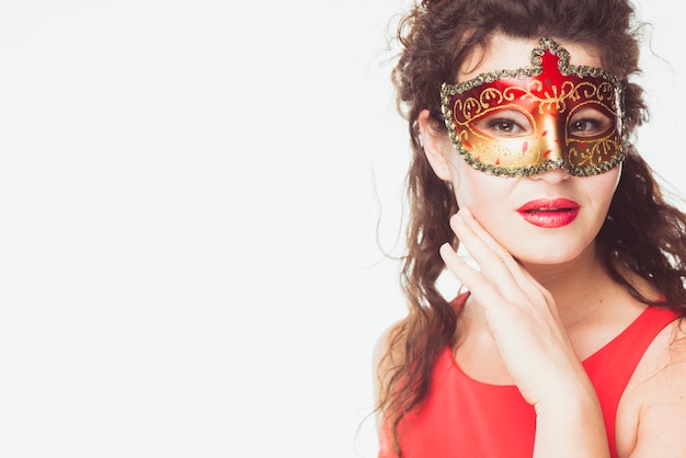 Pretty woman in carnival mask