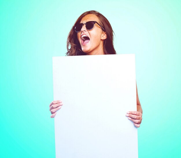 pretty woman holding a banner