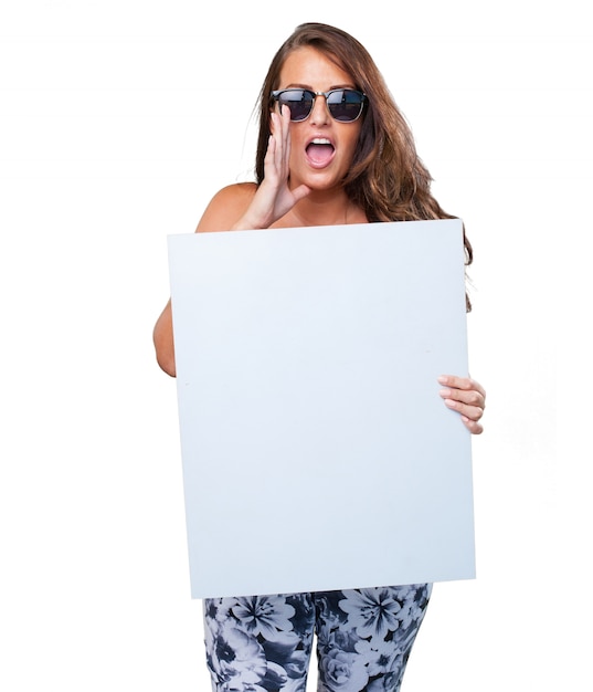 pretty woman holding a banner