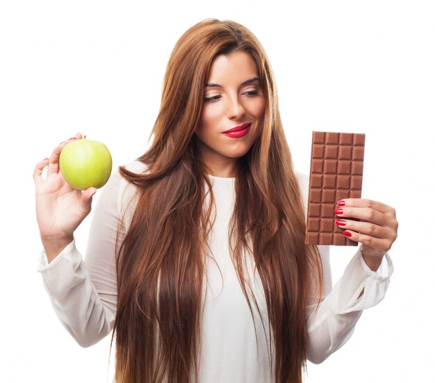 Pretty woman holding food products