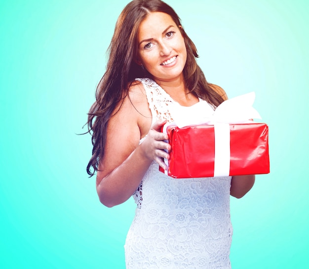 pretty woman holding a gift