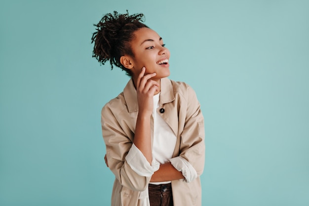 Pretty Woman Poses in Beige Trench Coat – Free Stock Photos
