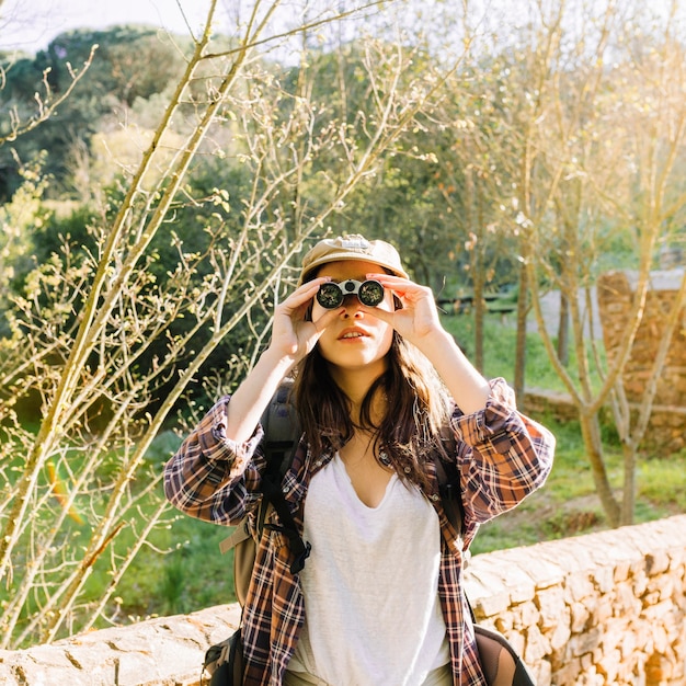 Pretty woman with binoculars