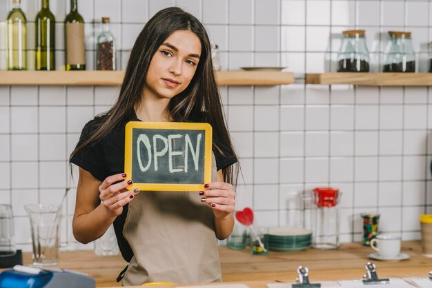 Pretty woman with open writing