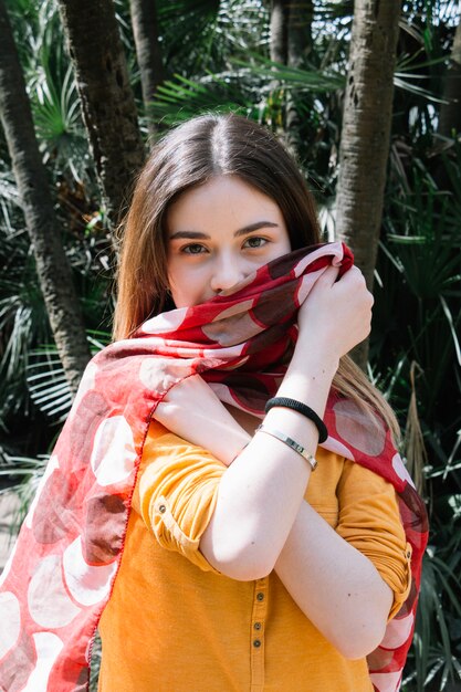 Pretty woman with silk scarf