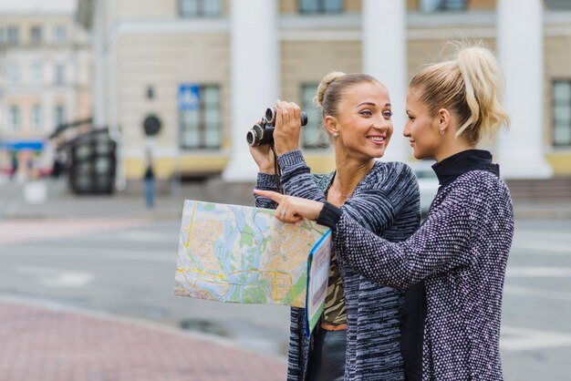 Pretty women sightseeing in city