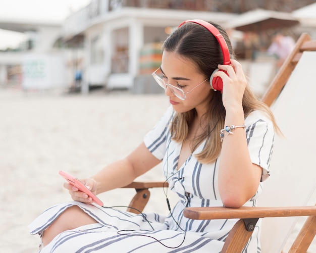 Pretty young girl relaxing at the beach