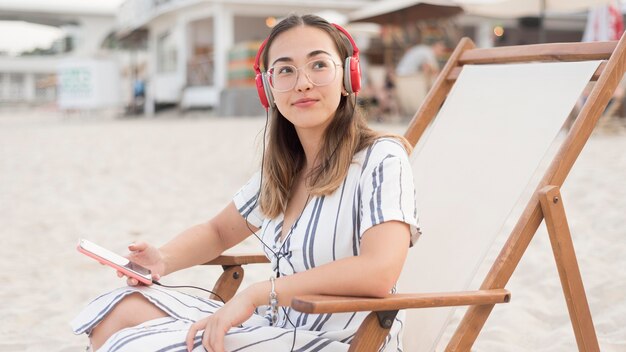 Pretty young girl relaxing at the beach