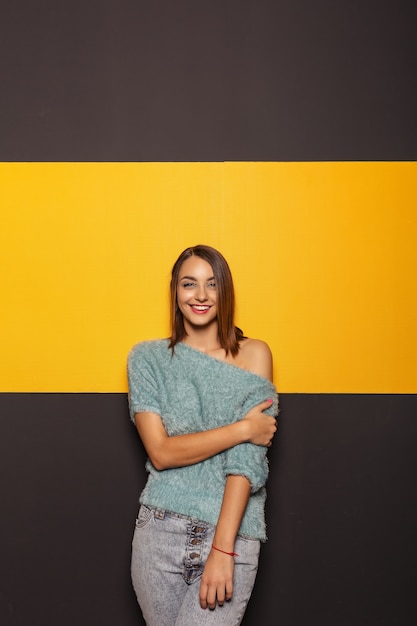 Free photo pretty young lady fooling around in studio